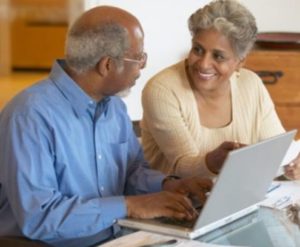 older-couple-african-american-computer-smiling